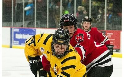 Bruins gain point in OT loss to Magicians